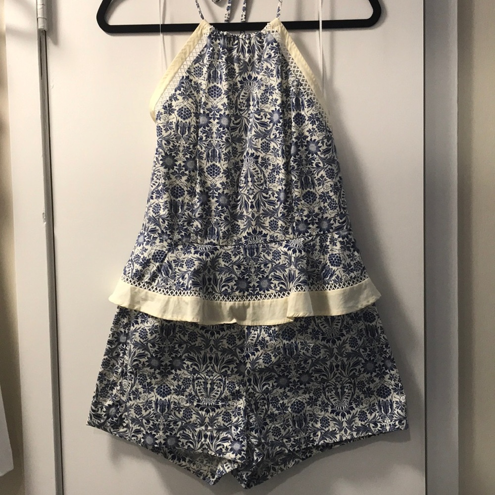 Open Back Peplum Floral Romper